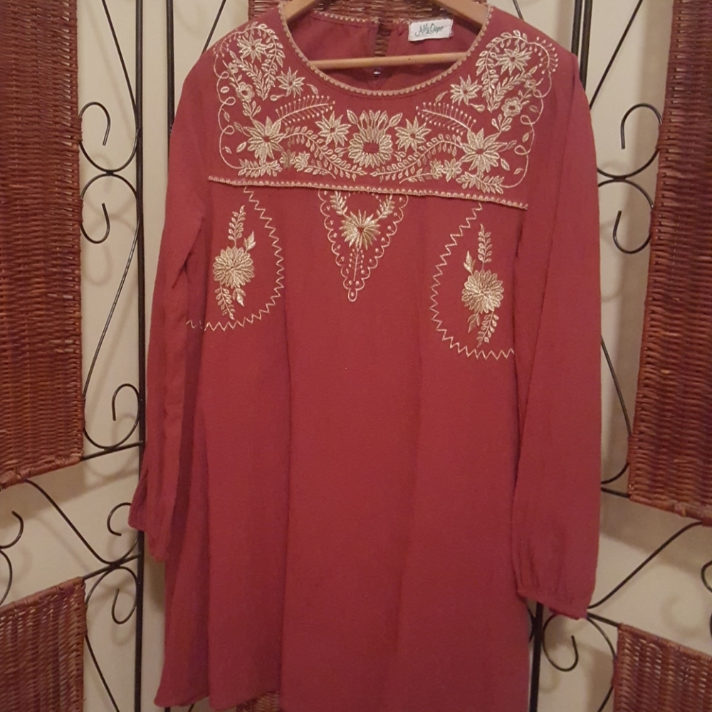 Gold embroidered red tunic